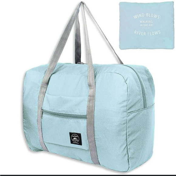 REI Handbags - Wind blows river flows blue water proof large duffel bag